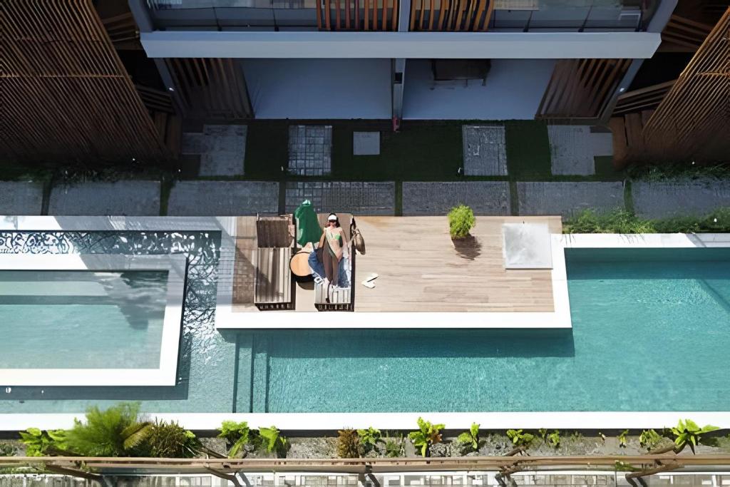 an overhead view of a house with a pool at Beira mar porto de pedras essence C101 in Pôrto de Pedras