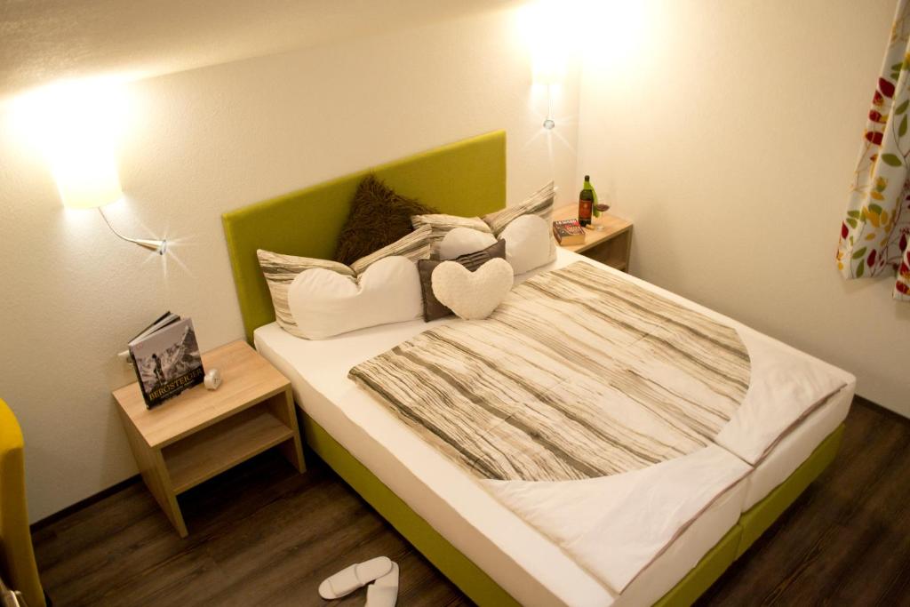Postel nebo postele na pokoji v ubytování Appartement Tirol