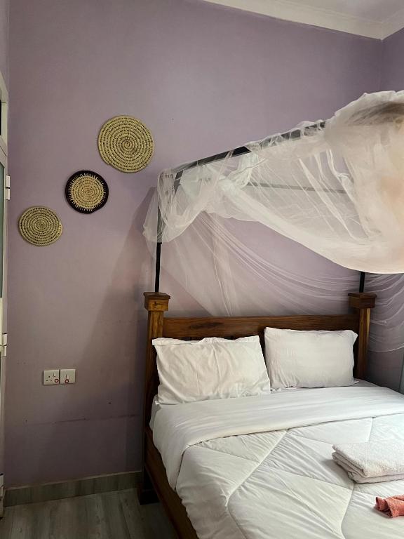 Ένα ή περισσότερα κρεβάτια σε δωμάτιο στο Shangama wilderness lodge Ngorongoro