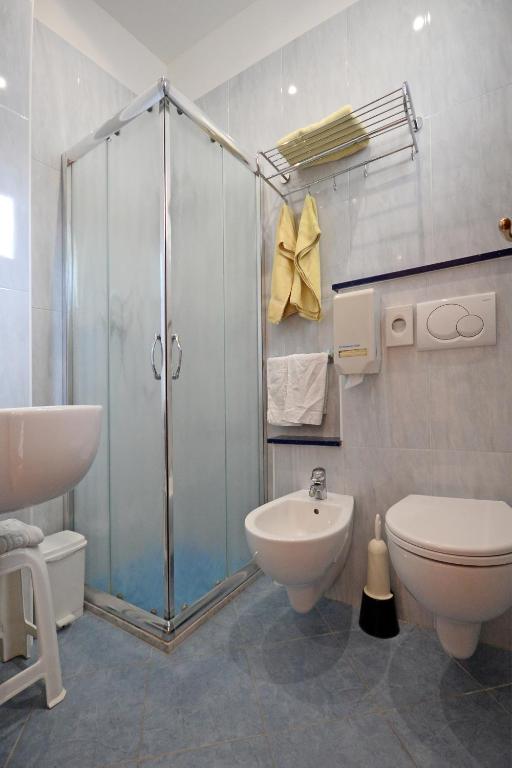 Koupelna v ubytování Hotel Concorde