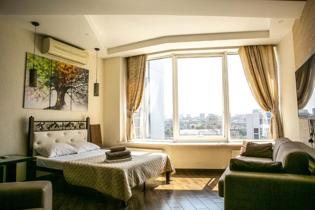 Postel nebo postele na pokoji v ubytování Doba In Ua Most-Sity Apartments