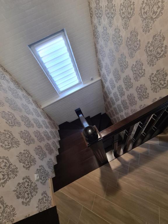 a view of a staircase with a window and a stair case at Perinka in Polyana