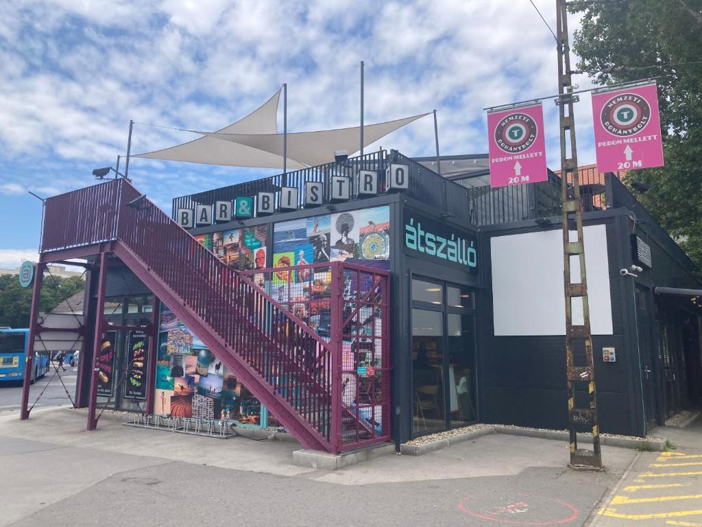 Hotel Poppy Flower Apartment, a building with a staircase on the side of it at Poppy Flower Apartment in Budapest