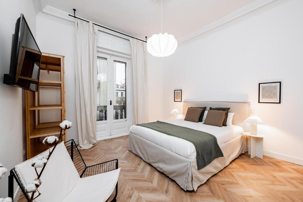 Postel nebo postele na pokoji v ubytování Victoria Boutique Stay