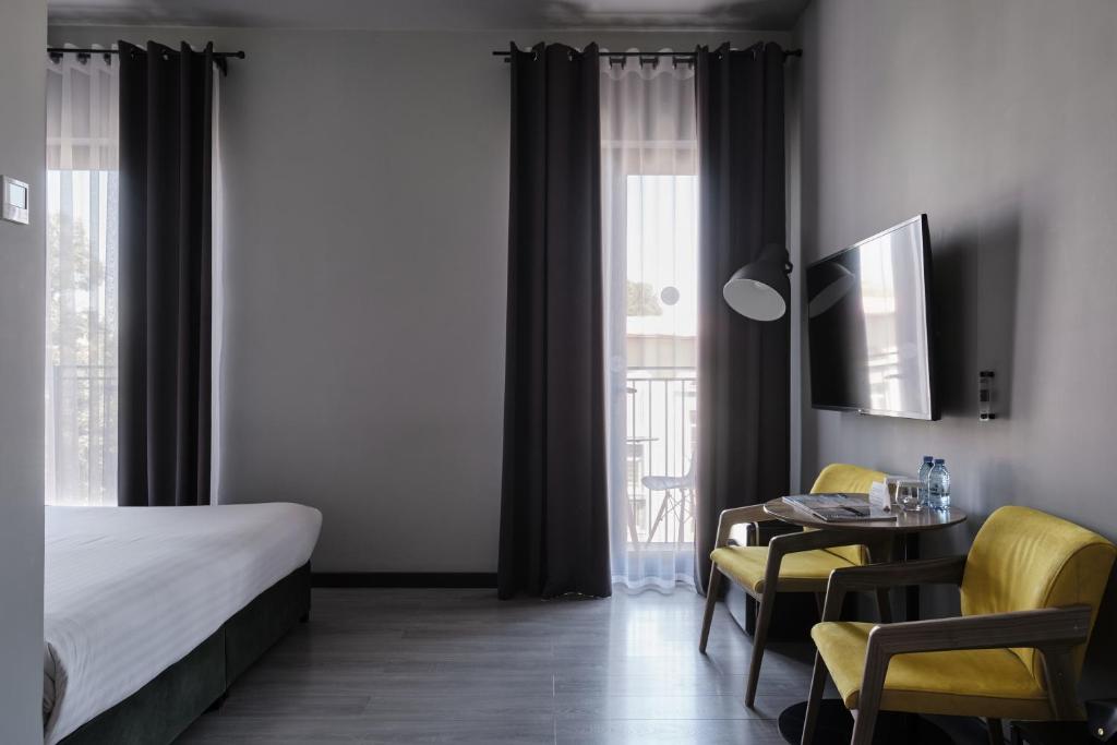 تصویر اتاق‌های Sapiens Hotel - تصویر ۲