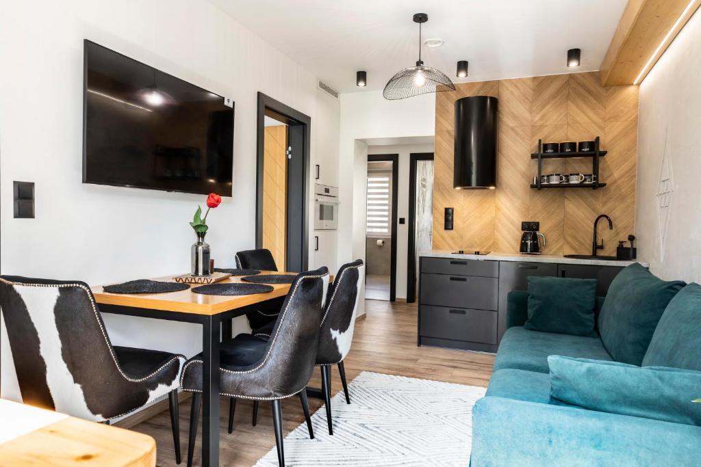 Kuchyň nebo kuchyňský kout v ubytování Apartamenty u Zajączków