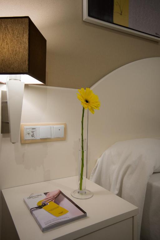 Postel nebo postele na pokoji v ubytování Hotel Torico Plaza