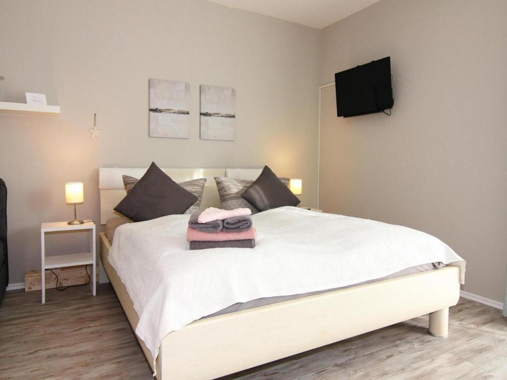Ένα ή περισσότερα κρεβάτια σε δωμάτιο στο Apartment Little Starfish, Wiek