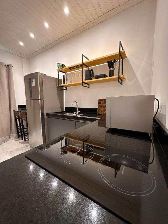 Kuchyň nebo kuchyňský kout v ubytování Loft Amplo na Serra Catarinense