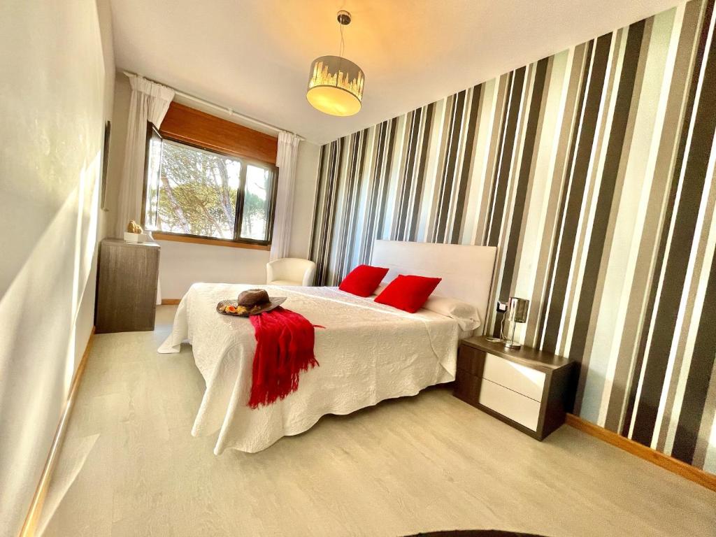 Ένα ή περισσότερα κρεβάτια σε δωμάτιο στο Apartment in Sanxenxo near Montalvo Beach