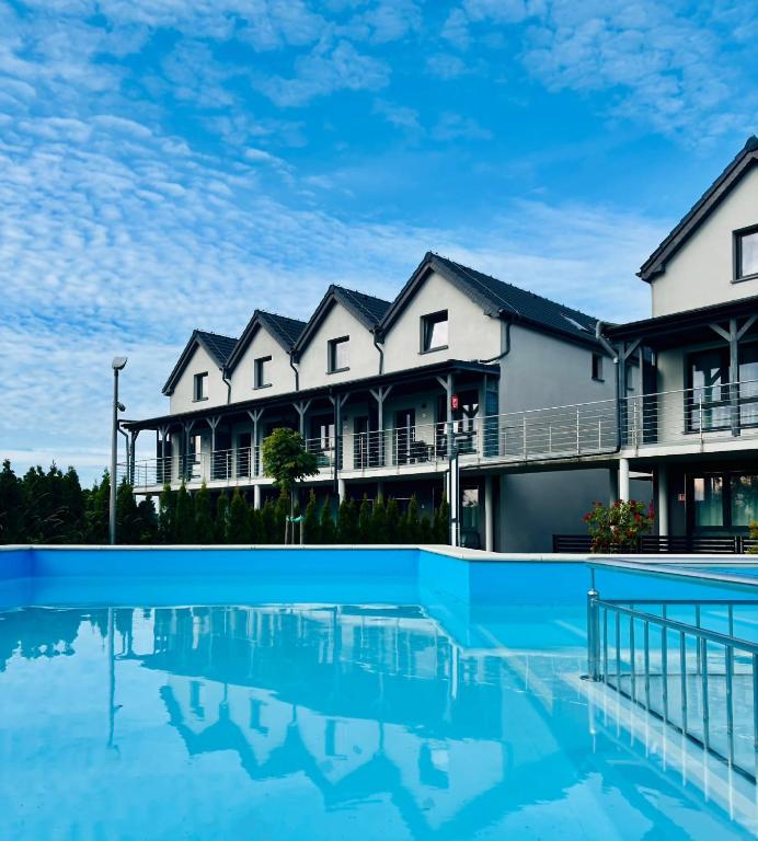 a view of a house with a swimming pool at Chill Out Rewal House in Rewal