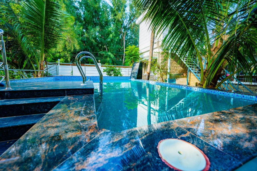 Πισίνα στο ή κοντά στο SSS Farm House