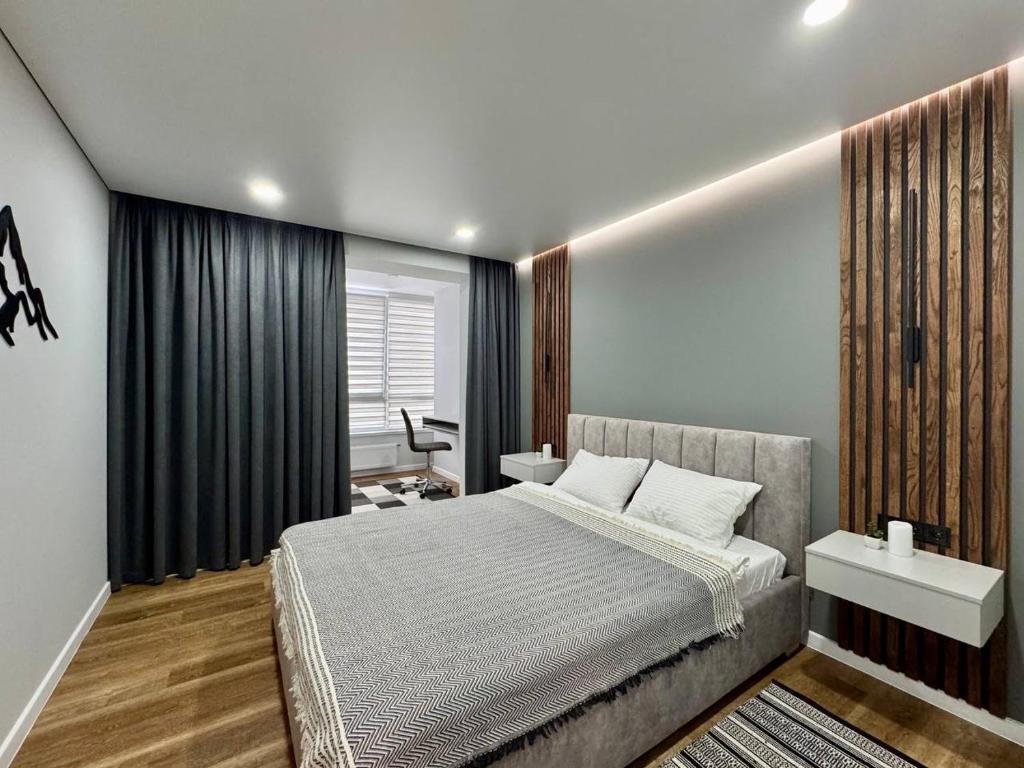 Postel nebo postele na pokoji v ubytování Апартаменти Скандинавський затишок