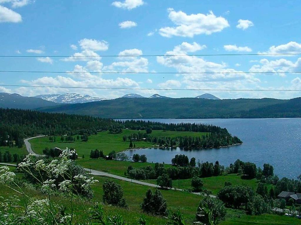 a view of a lake with mountains in the background at 6 person holiday home in Nordli-By Traum in Holand