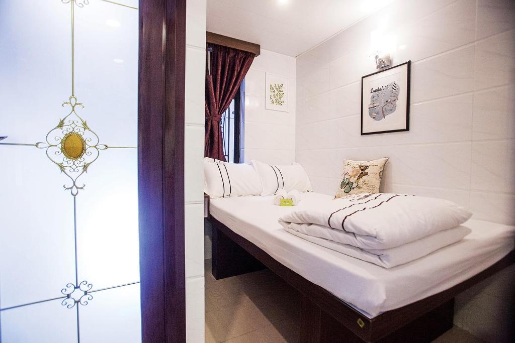 Voodi või voodid majutusasutuse Sun Guest House toas