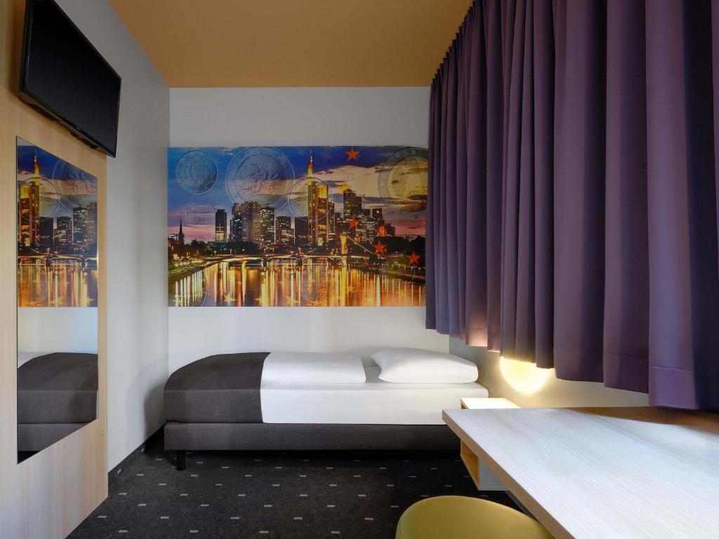 B&B HOTEL Frankfurt City-Ost - Resim 25