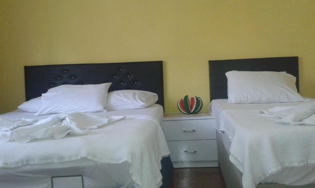 Postel nebo postele na pokoji v ubytování Bereket traveler Hotel