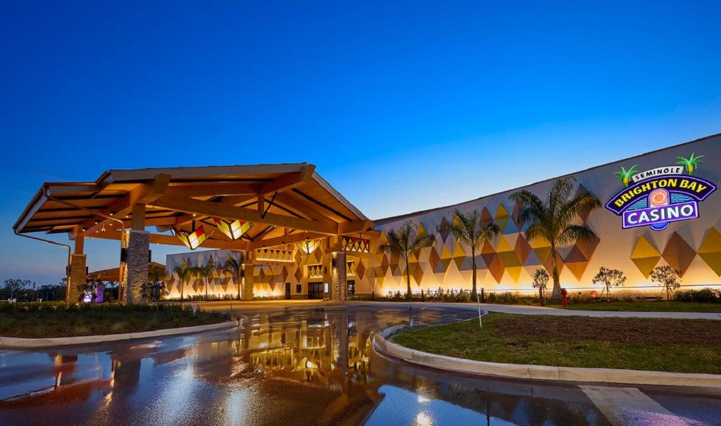 a building with a sign on the side of it at Seminole Brighton Bay Hotel & Casino in Okeechobee