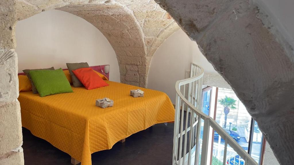 Ένα ή περισσότερα κρεβάτια σε δωμάτιο στο casetta sole