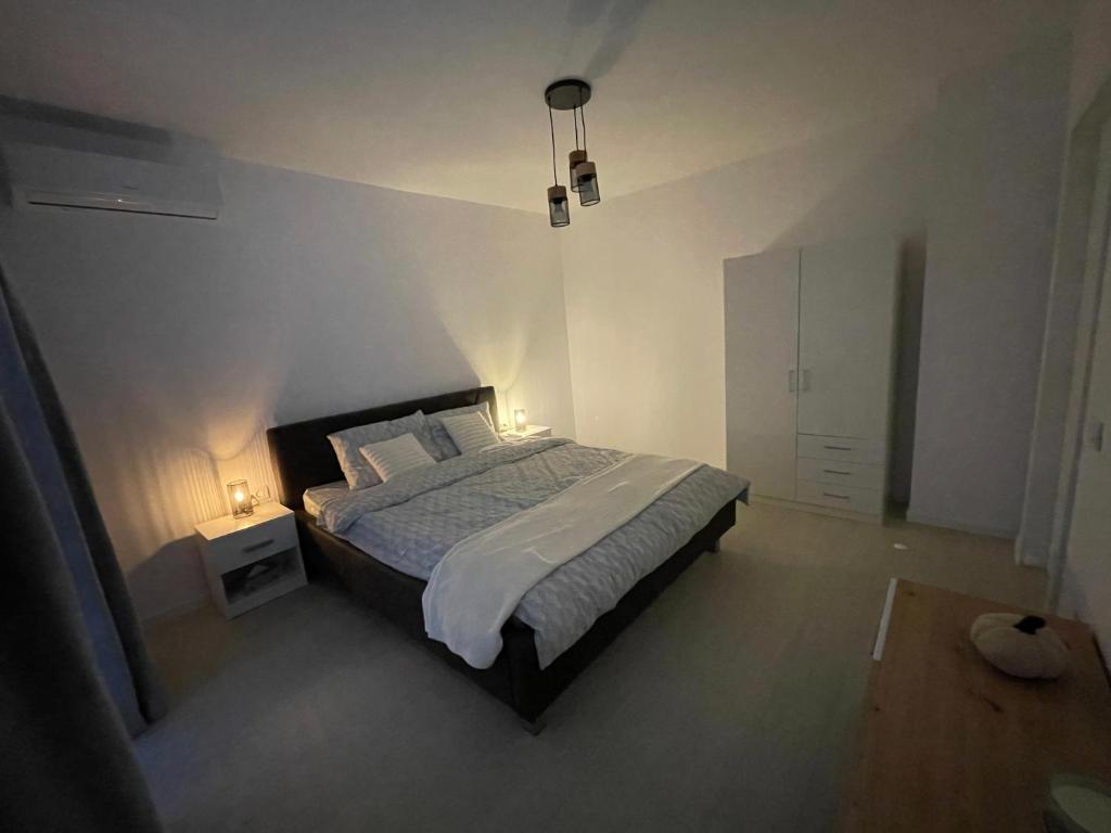 Postel nebo postele na pokoji v ubytování Studio KERM