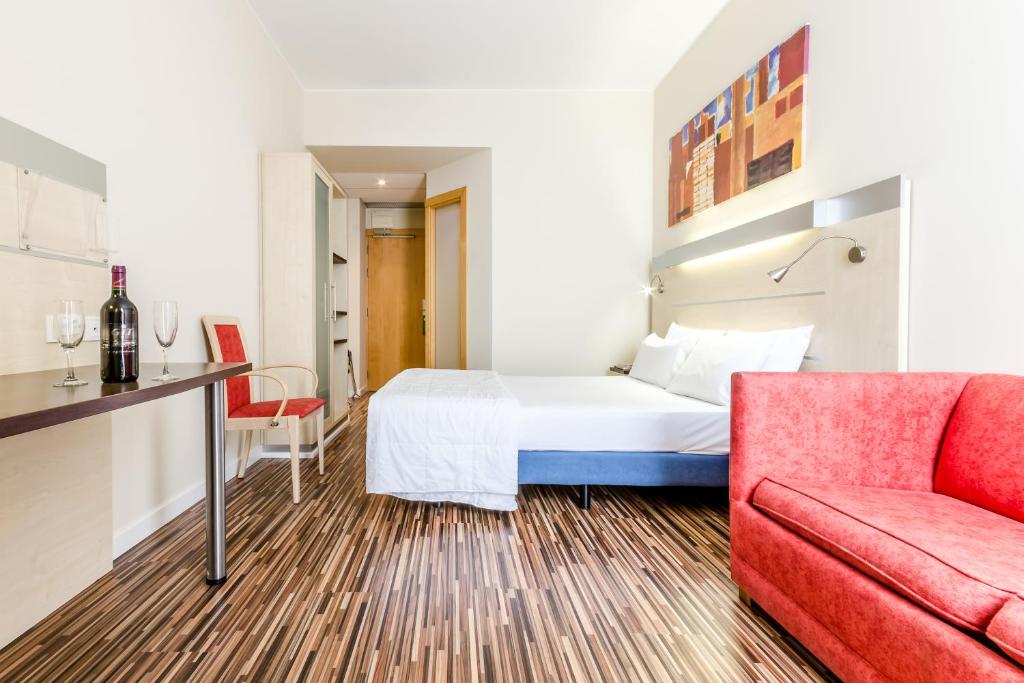 Postel nebo postele na pokoji v ubytování Hotel YIT Ciudad De Zaragoza