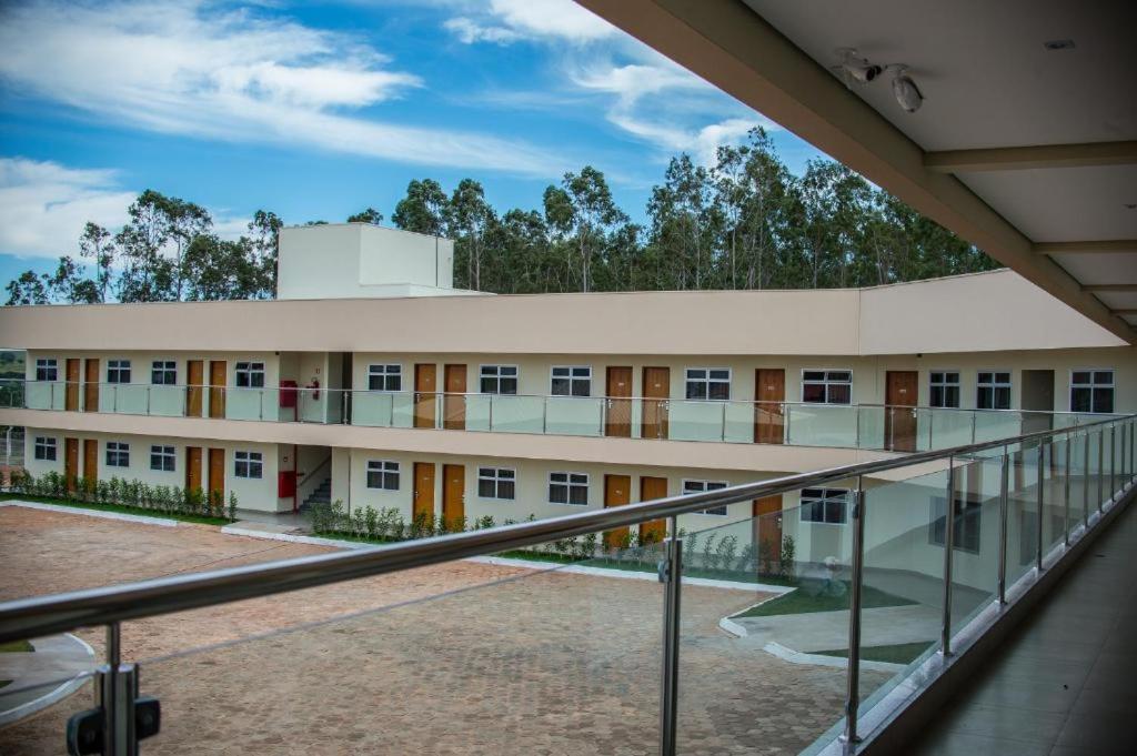 an external view of a building at Decio Hotel - Presidente Venceslau Antigo KHotel in Presidente Venceslau
