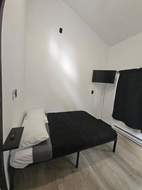 Ένα ή περισσότερα κρεβάτια σε δωμάτιο στο Vibing In The Woods #6