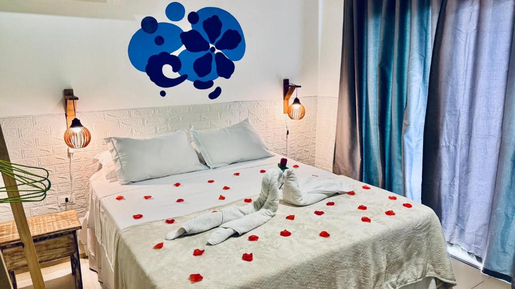 Krevet ili kreveti u jedinici u okviru objekta Pousada Praiana - Noronha