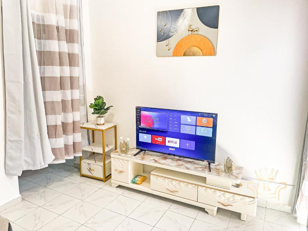 TV a/nebo společenská místnost v ubytování KIM'S Appartments - Nsam