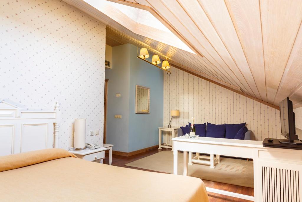 Postel nebo postele na pokoji v ubytování Hotel Azofra