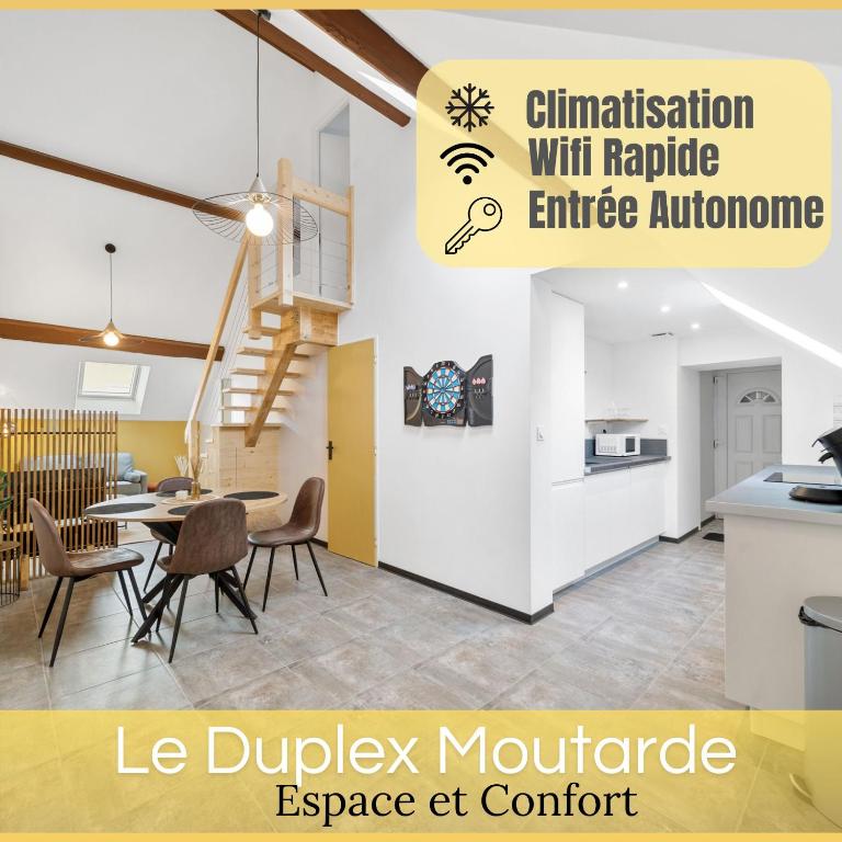 a dining room with a table and chairs at Le Duplex Moutarde, prox centre et Gare, 50m2, climatisation in Chalon-sur-Saône