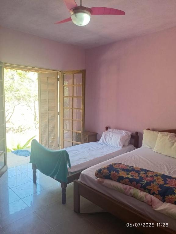 Ένα ή περισσότερα κρεβάτια σε δωμάτιο στο Casa Carmen