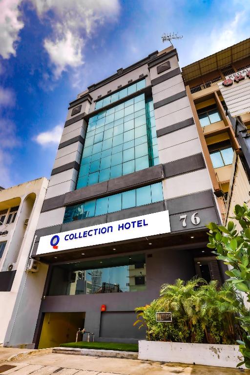 a building with a sign that reads collection hotel at Q Collection Macalister formerly known as Apple Hotel Penang in George Town