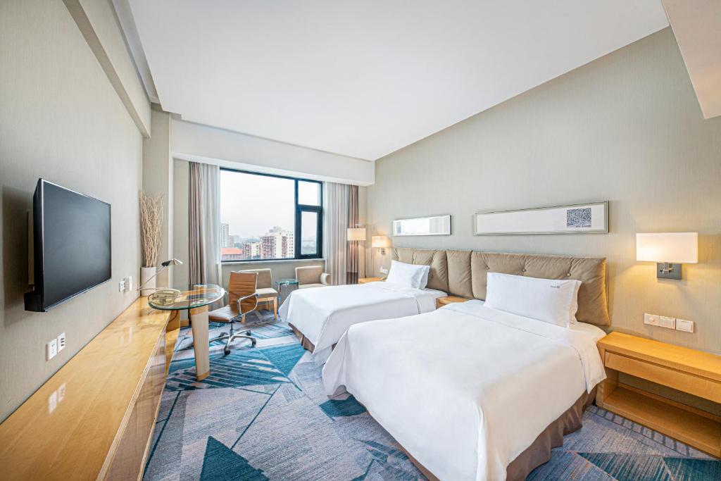 فضای داخلی Holiday Inn Beijing Deshengmen by IHG در پکن - تصویر ۳