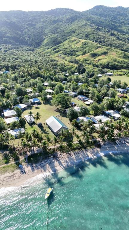 an aerial view of a beach with a resort at Tai Bee Homestay in Soso
