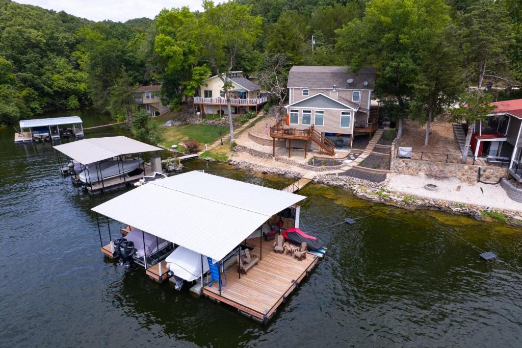 an aerial view of a dock on a body of water at Charming Waterfront Cabin - Sleeps 10 in Rocky Mount