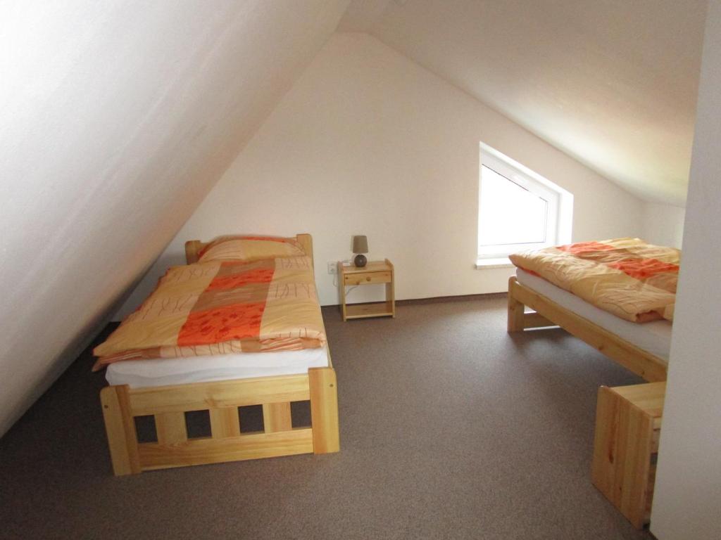 Postel nebo postele na pokoji v ubytování Villa Joanna