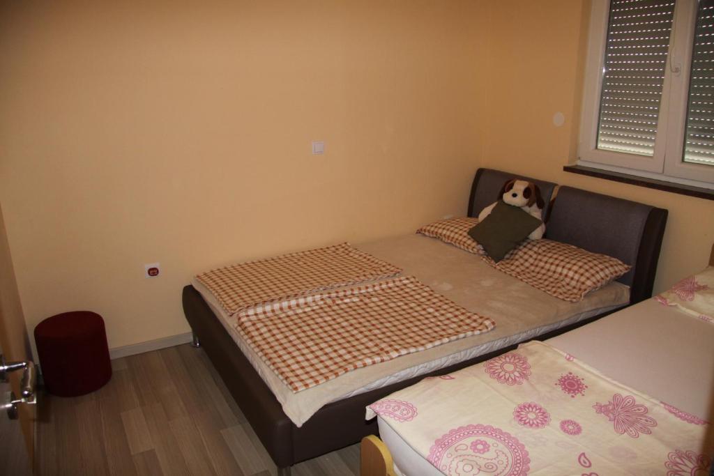 Posteľ alebo postele v izbe v ubytovaní Apartment Pal