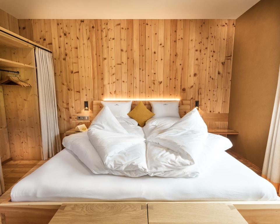 Łóżko lub łóżka w pokoju w obiekcie Chalet Rudana