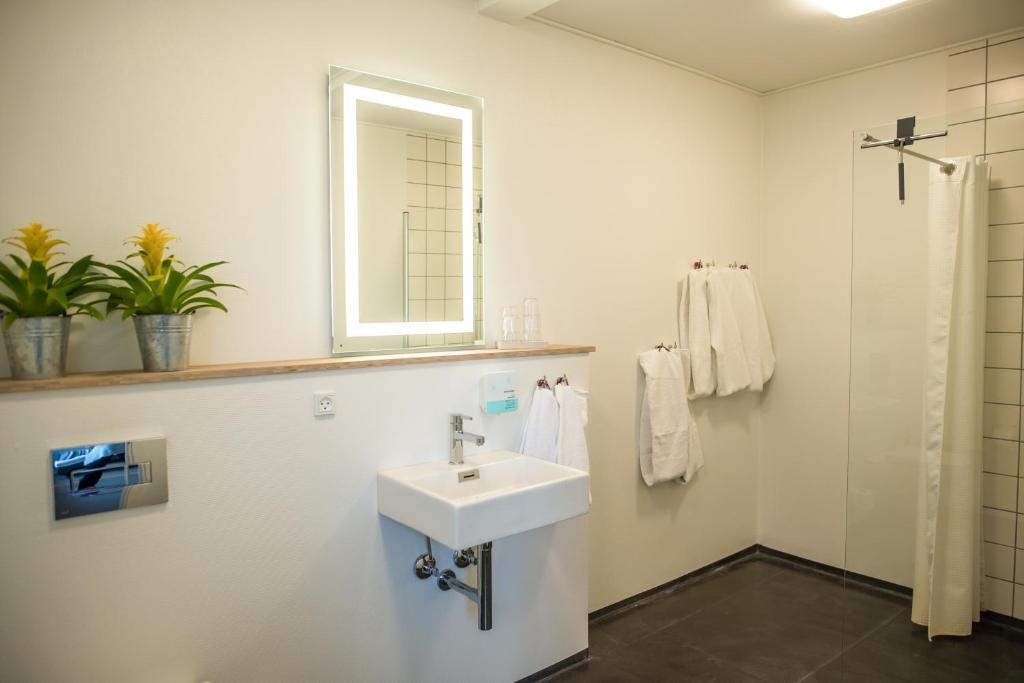 Koupelna v ubytování Refborg Hotel