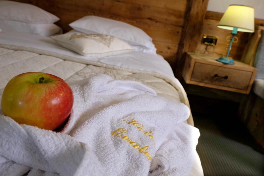 Postel nebo postele na pokoji v ubytování Hotel Evaldo