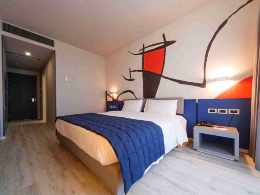 Postel nebo postele na pokoji v ubytování JR Hotels Gigli Firenze