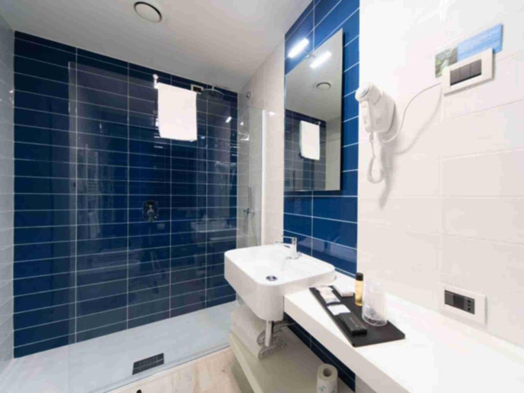Koupelna v ubytování JR Hotels Gigli Firenze