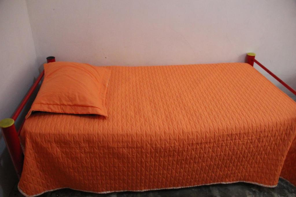Postel nebo postele na pokoji v ubytování Hostal Mi Castillo