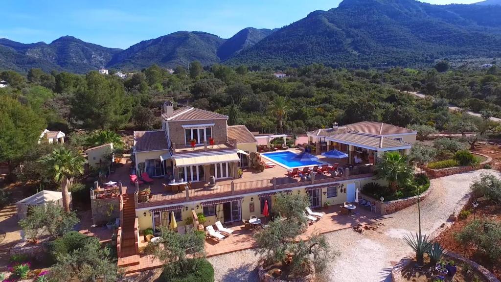 an aerial view of a house with a swimming pool at Finca Sonrisa in Alhaurín el Grande