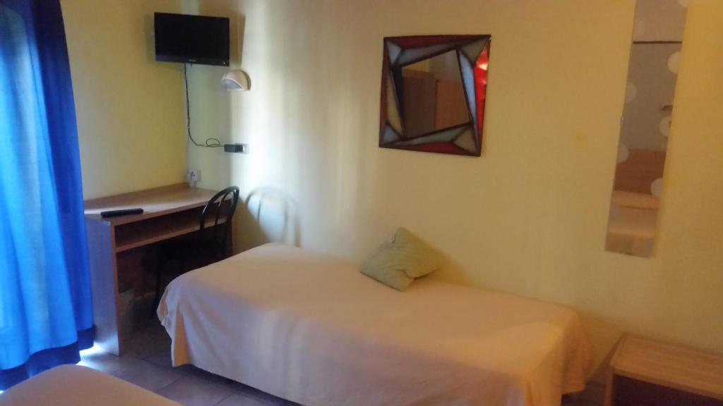 Postel nebo postele na pokoji v ubytování Hotel Stazione