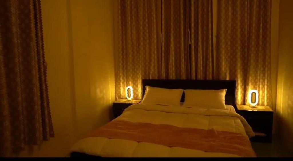 Cama o camas de una habitación en Vestawood Orchid Resort, Dawki Meghalaya