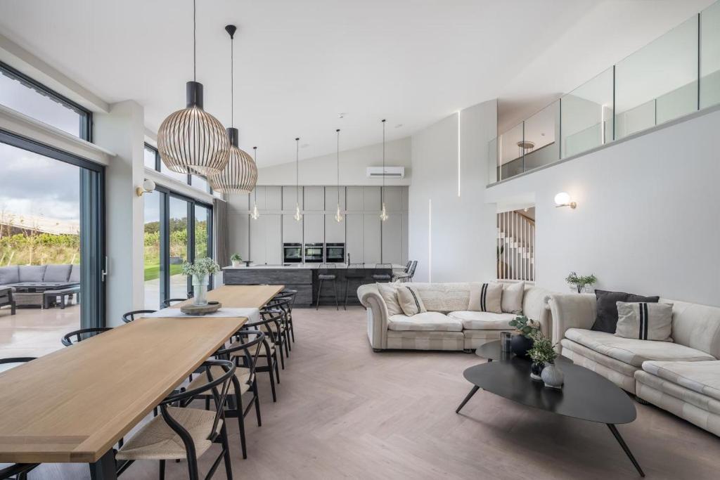 a living room with a table and a couch at 7 Bed in Marwood oc-w32673 in Marwood