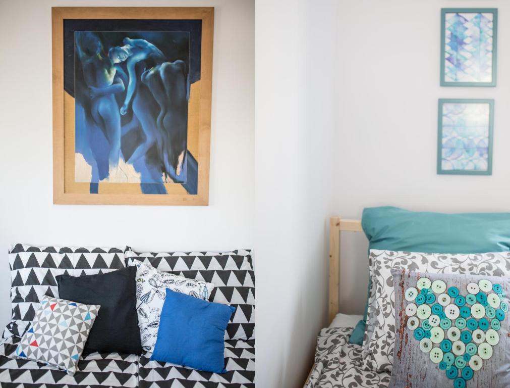 Posteľ alebo postele v izbe v ubytovaní Apartament Batory