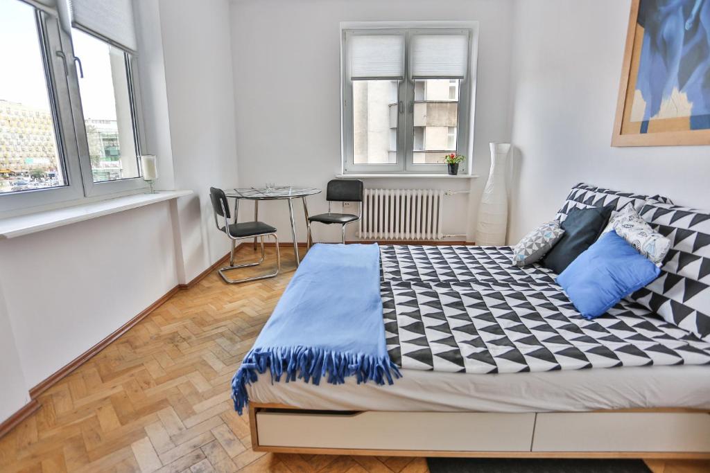 Posteľ alebo postele v izbe v ubytovaní Apartament Batory